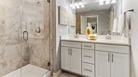 1101 Atterberg Road South Elgin, IL 60177 - Photo 14 of 18 a bathroom with a sink and mirror with toilet