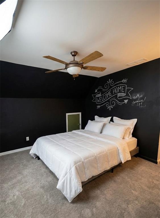 3701 Landau Lane Southwest Atlanta, GA 30331 - Photo 11 of 14 a bedroom with a bed and a night stand