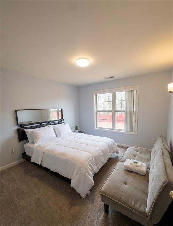 3701 Landau Lane Southwest Atlanta, GA 30331 - Photo 7 of 14 a bedroom with bed and window