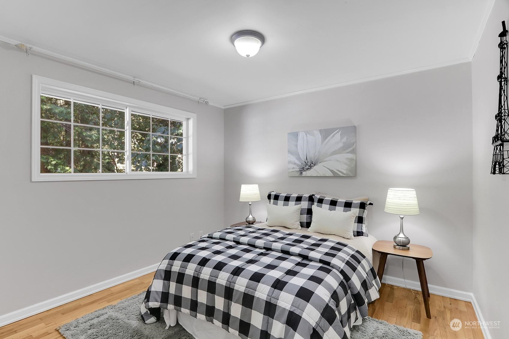 103 231st Street Southeast Bothell, WA 98021 - Photo 21 of 33 a bedroom with a bed and a lamp on table