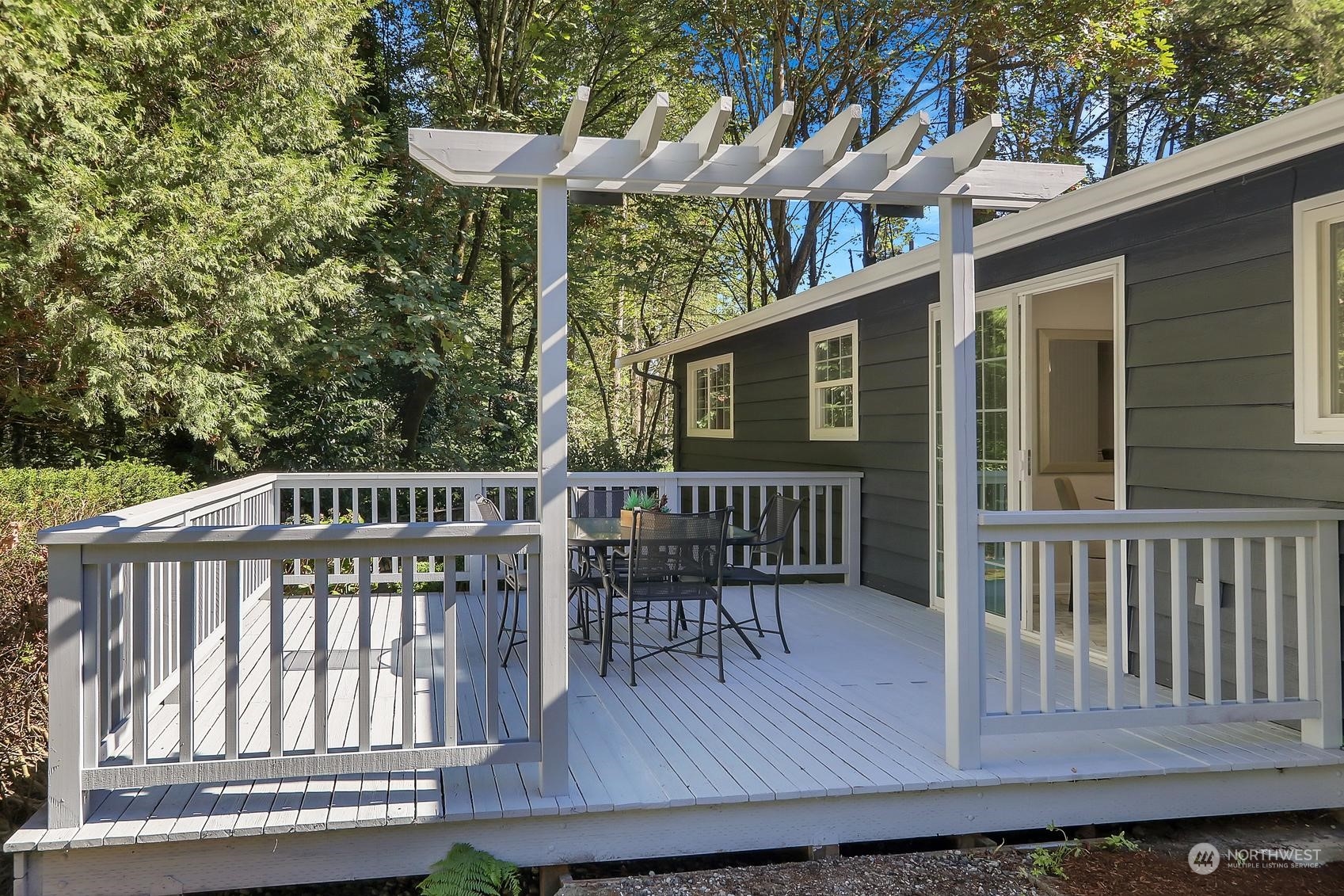 103 231st Street Southeast Bothell, WA 98021 - Photo 28 of 33 a view of a chair and table on the deck