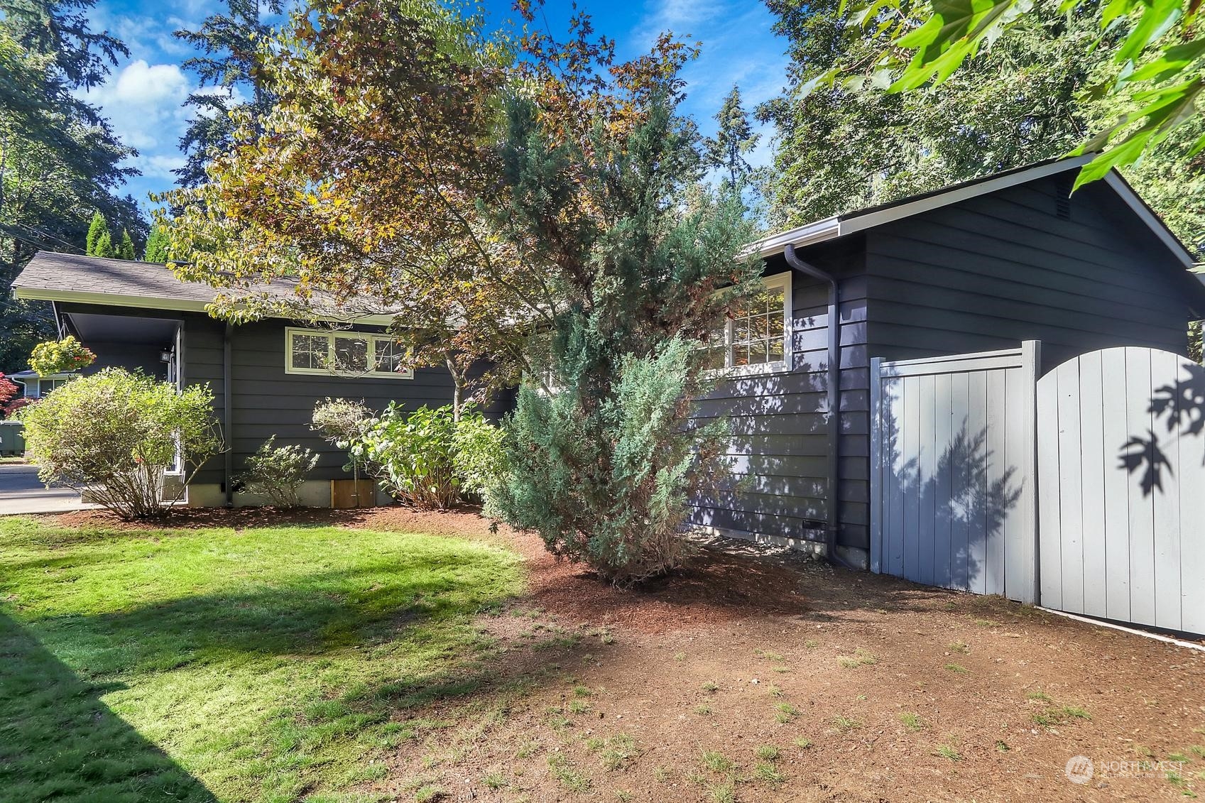103 231st Street Southeast Bothell, WA 98021 - Photo 33 of 33 a view of a house with yard and a garden