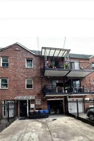 a view of a cafe with sitting area