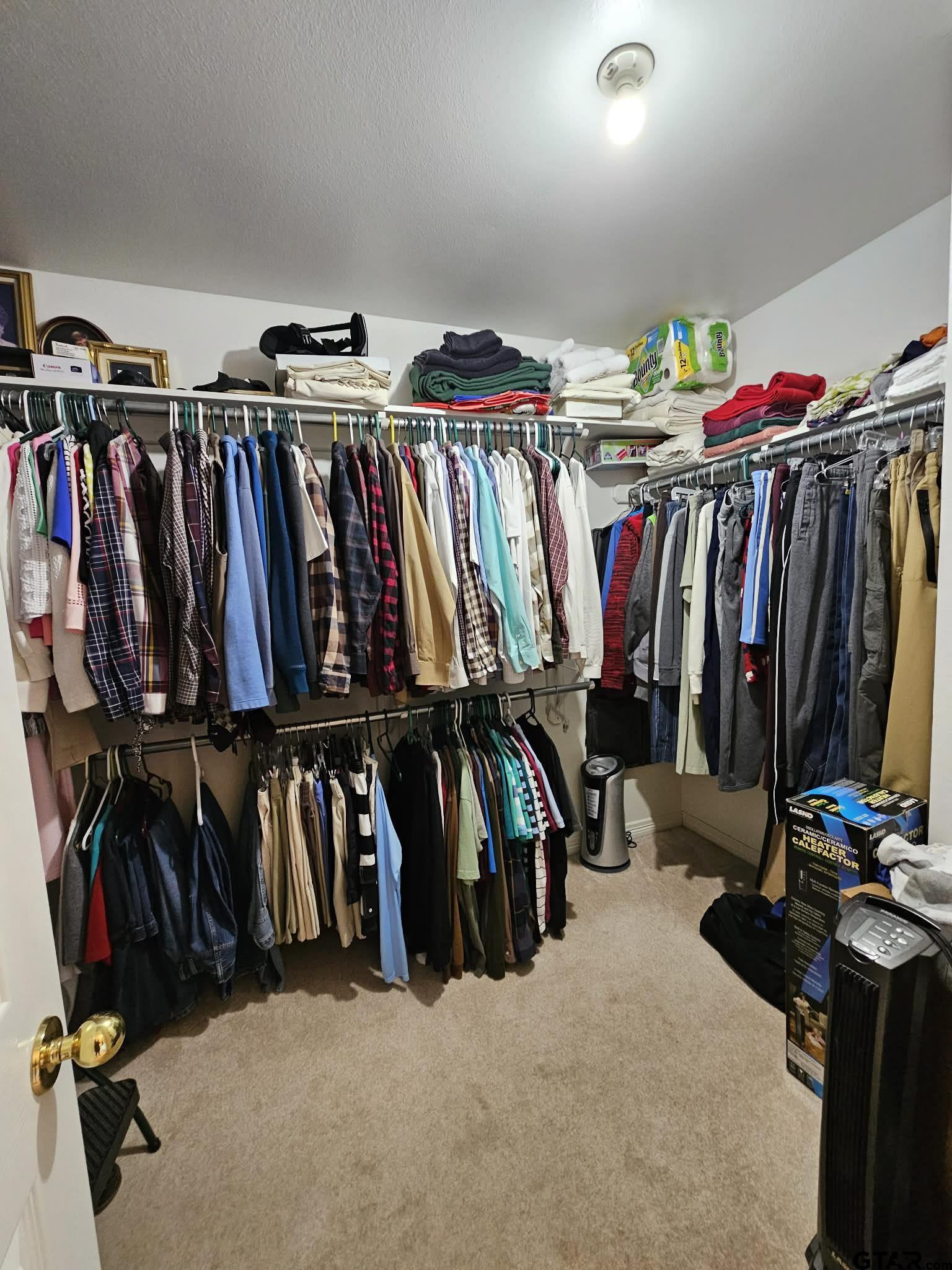 2001 Venture View Palestine, TX 75803 - Photo 21 of 28 a view of walk in closet with clothes