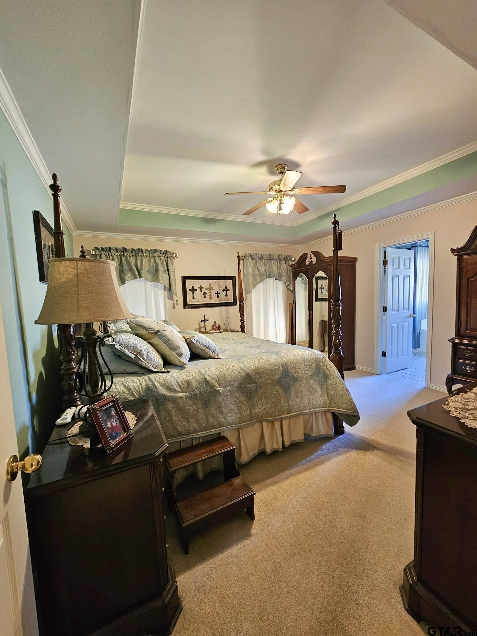 2001 Venture View Palestine, TX 75803 - Photo 7 of 28 a spacious bedroom with a bed gym equipment and a mirror