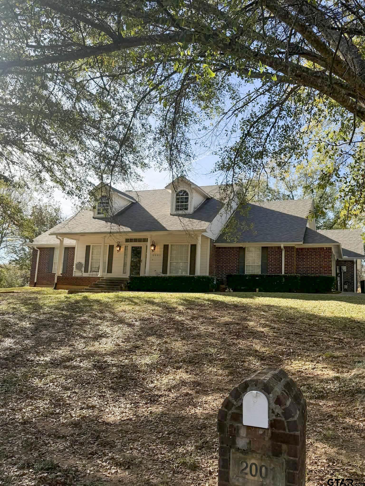 2001 Venture View Palestine, TX 75803 - Photo 8 of 28 a front view of a house with a yard