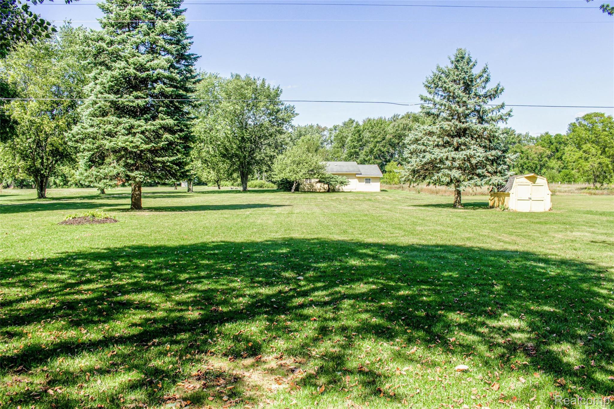 58504 Travis Road New Hudson, MI 48165 - Photo 43 of 53 Back yard