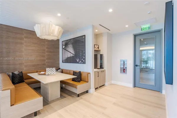 a workspace with furniture and window