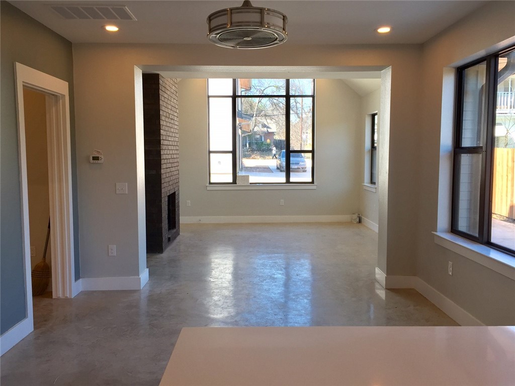 5621 Adams Avenue, Unit B Austin, TX 78756 - Photo 5 of 7 a view of an empty room with a window