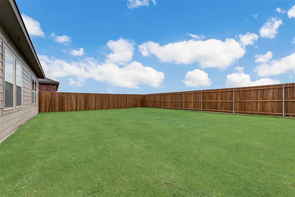 1428 Millstead Rill Drive Caddo Mills, TX 75135 - Photo 23 of 24 a view of backyard with barn and green space