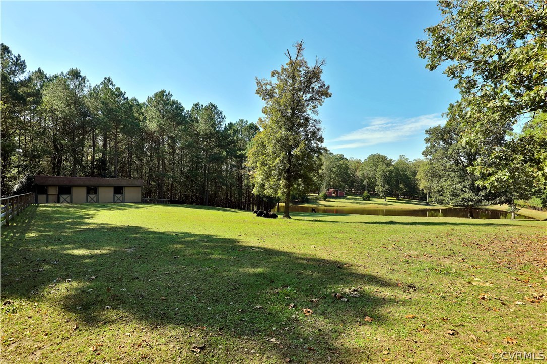 6400 Moseley Road Moseley, VA 23120 - Photo 45 of 47 a view of a swimming pool with a yard