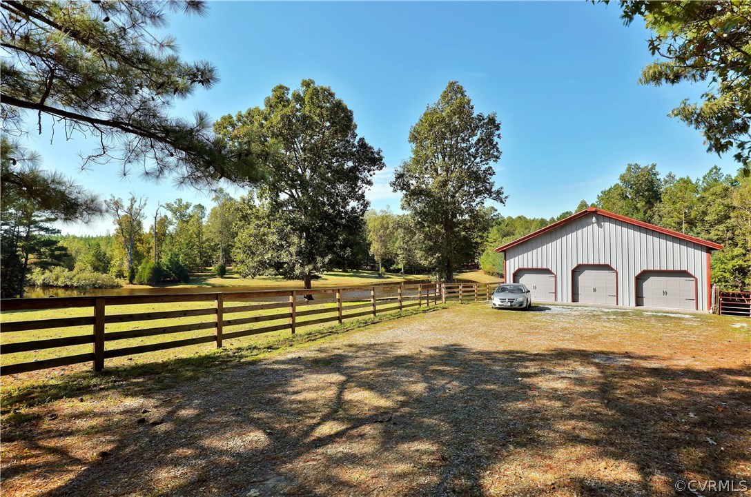 6400 Moseley Road Moseley, VA 23120 - Photo 46 of 47 a view of a yard with wooden fence