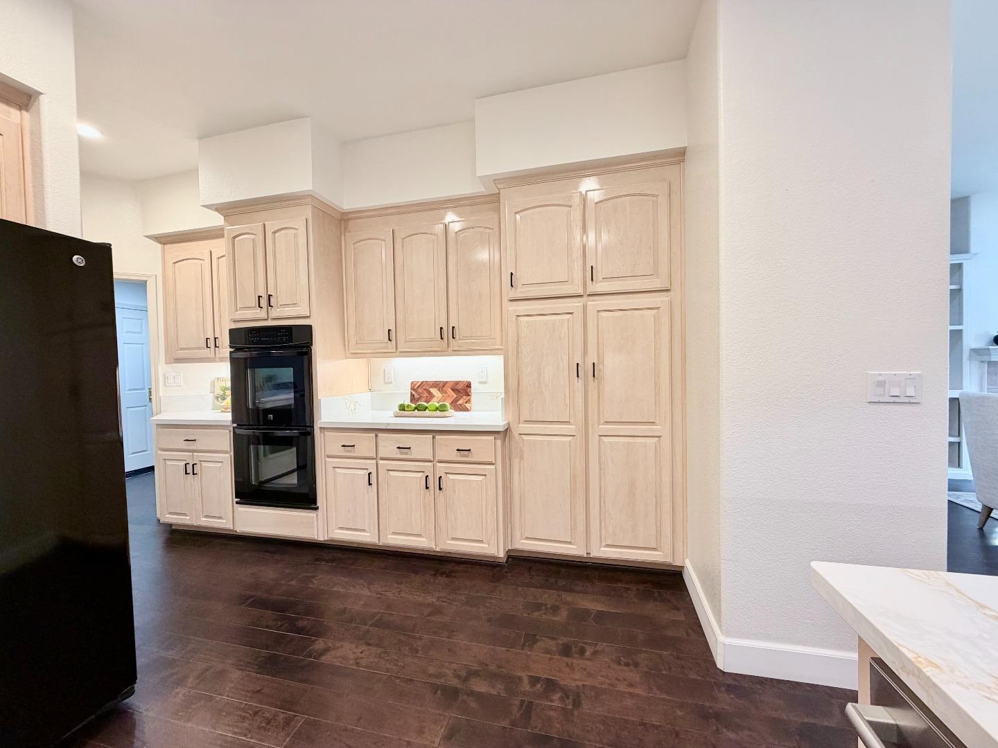 8718 McCarty Ranch Drive San Jose, CA 95135 - Photo 15 of 60 a kitchen with stainless steel appliances a refrigerator and a stove top oven