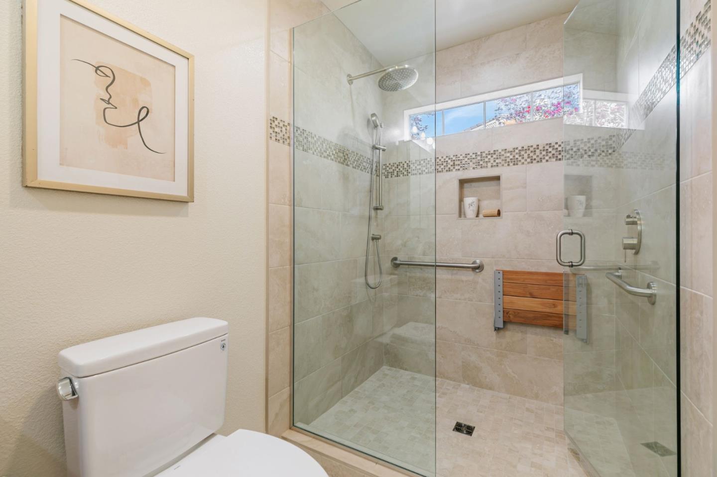 8718 McCarty Ranch Drive San Jose, CA 95135 - Photo 34 of 60 a bathroom with a shower and toilet