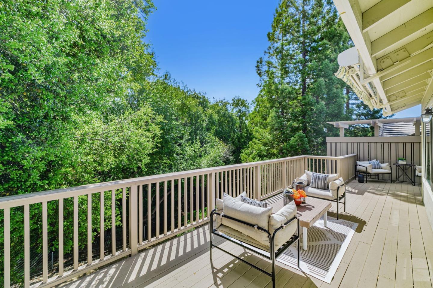 8718 McCarty Ranch Drive San Jose, CA 95135 - Photo 36 of 60 a view of balcony with wooden floor and outdoor seating