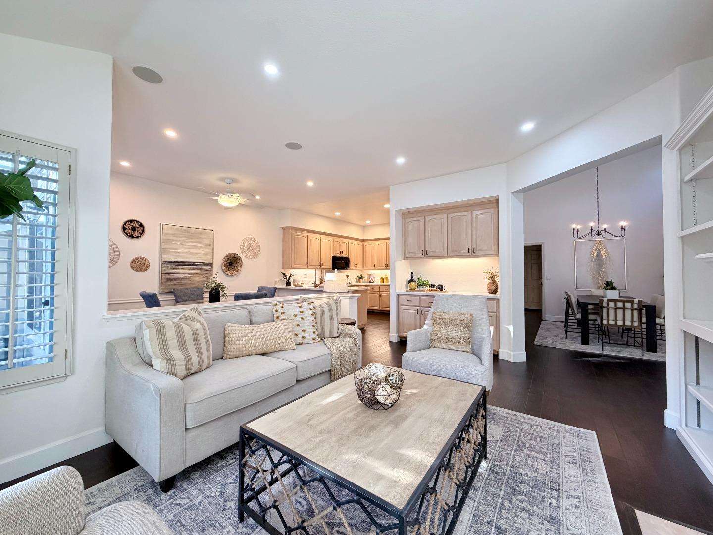 8718 McCarty Ranch Drive San Jose, CA 95135 - Photo 6 of 60 a living room with furniture kitchen view and a table