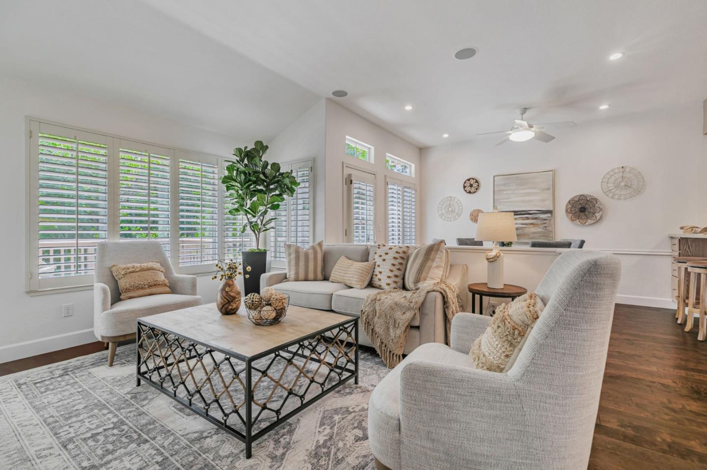 8718 McCarty Ranch Drive San Jose, CA 95135 - Photo 8 of 60 a living room with furniture potted plant and a window