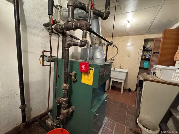 $1,175,000 | 73-30 67th Drive | Middle Village