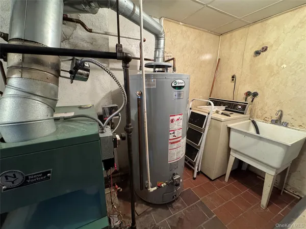 $1,175,000 | 73-30 67th Drive | Middle Village