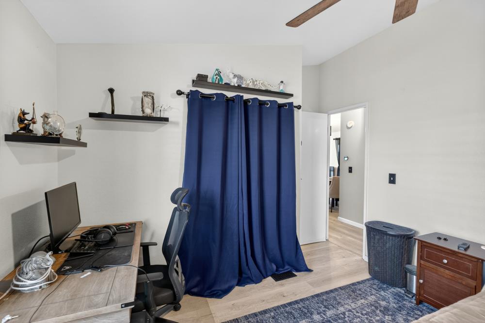 102 Village Circle Sacramento, CA 95838 - Photo 20 of 32 a view of workspace with wooden floor and windows