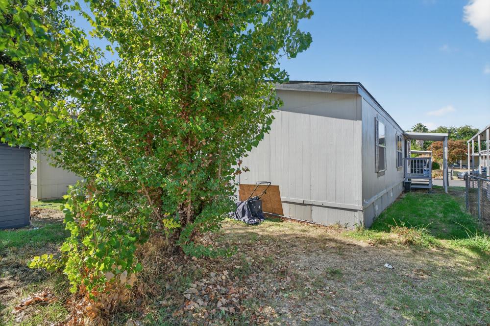 102 Village Circle Sacramento, CA 95838 - Photo 22 of 32 a backyard of a house with lots of green space