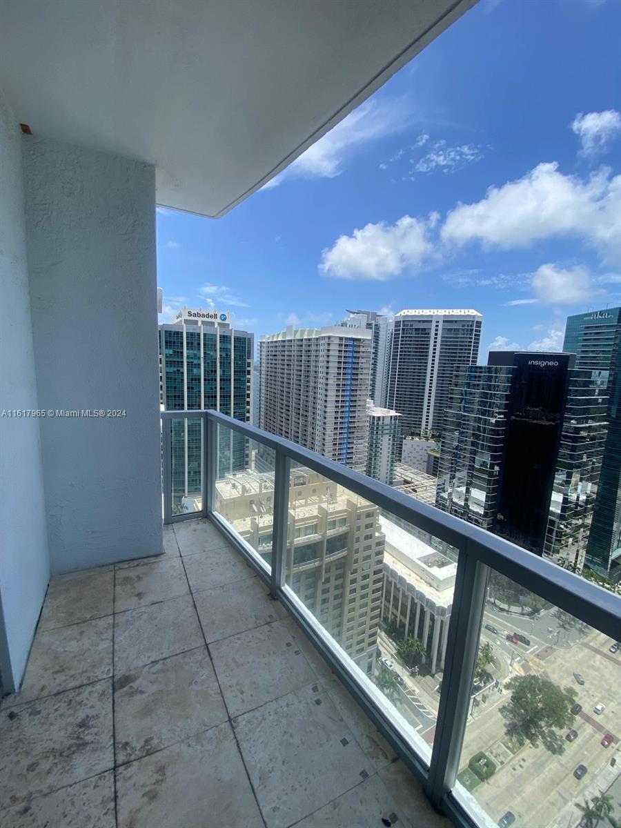1060 Brickell Avenue, Unit 3309 Miami, FL 33131 - Photo 22 of 25 a view of balcony with furniture