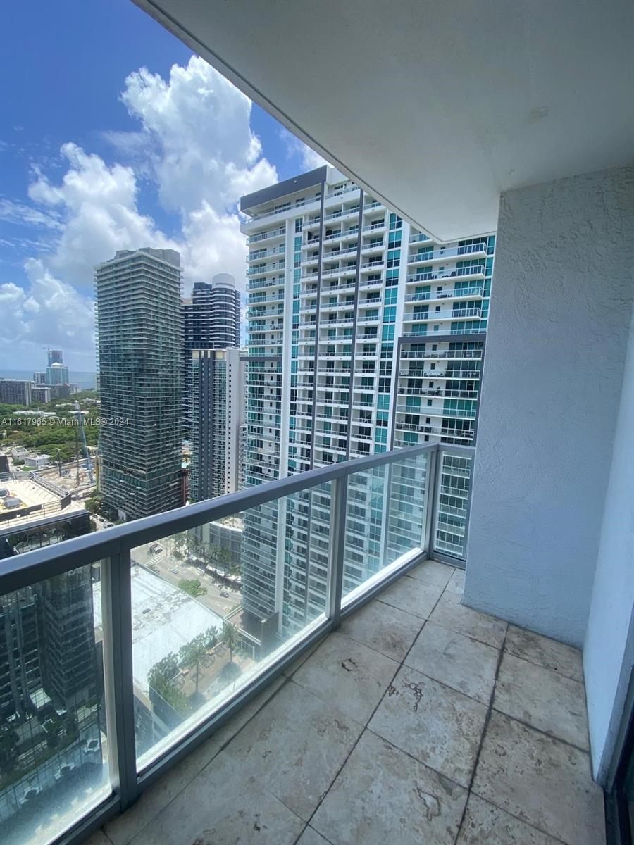 1060 Brickell Avenue, Unit 3309 Miami, FL 33131 - Photo 24 of 25 a view of balcony with wooden floor