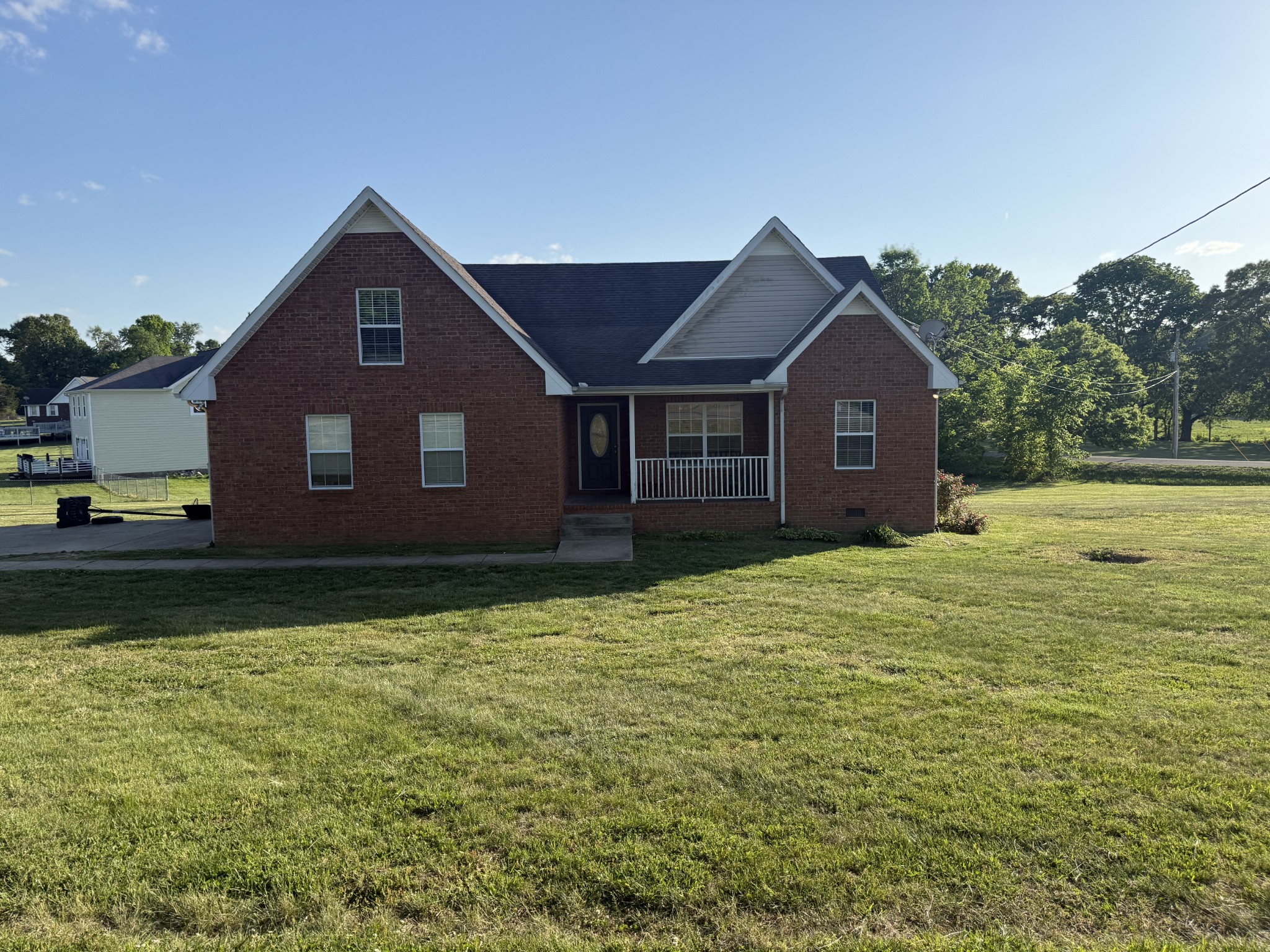 1702 Abiff Road Burns, TN 37029 - Photo 2 of 47 a view of a house with a yard