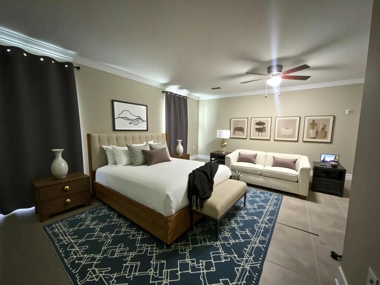 4716 Chanson Crossing Crestview, FL 32539 - Photo 7 of 16 a spacious bedroom with a bed and glass walk in closet