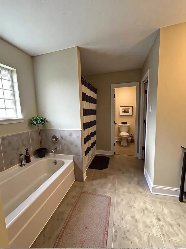 4716 Chanson Crossing Crestview, FL 32539 - Photo 8 of 16 a view of a bedroom with washing machine