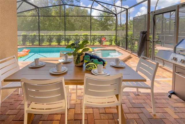 a vase of flowers sitting on a table