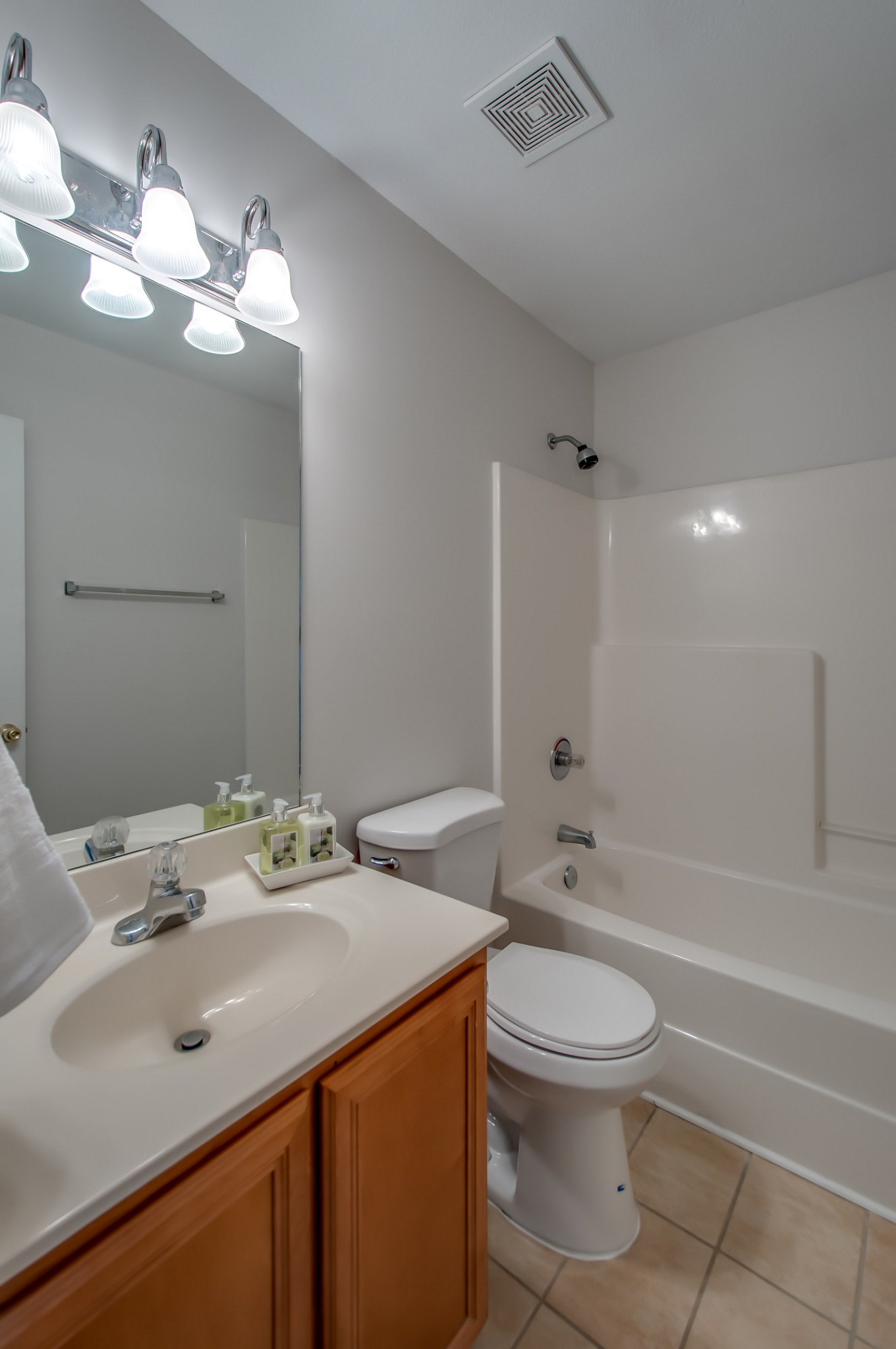 1949 Portway Road Spring Hill, TN 37174 - Photo 23 of 34 a bathroom with a sink a toilet and shower