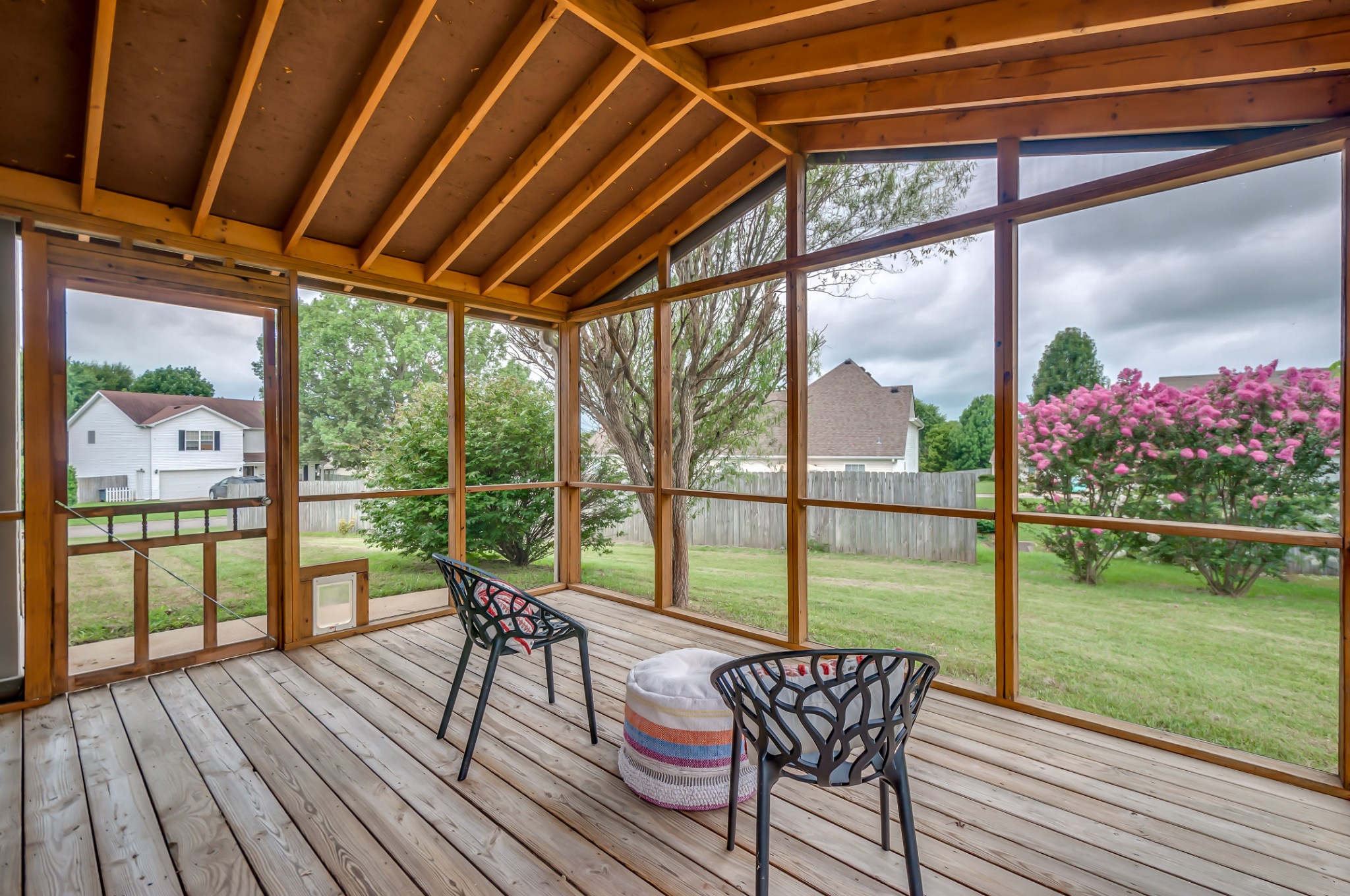 1949 Portway Road Spring Hill, TN 37174 - Photo 32 of 34 a balcony with wooden floor table and chairs