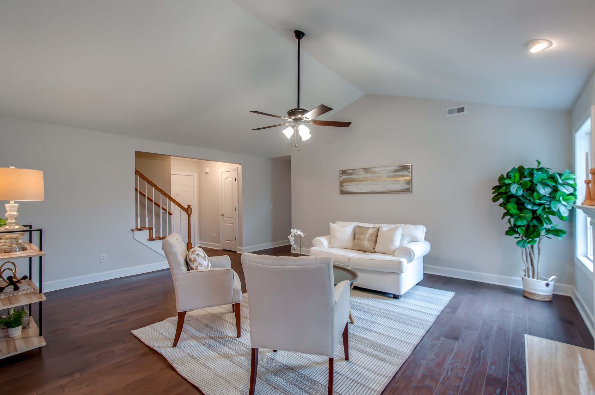 1949 Portway Road Spring Hill, TN 37174 - Photo 8 of 34 a living room with furniture and a potted plant