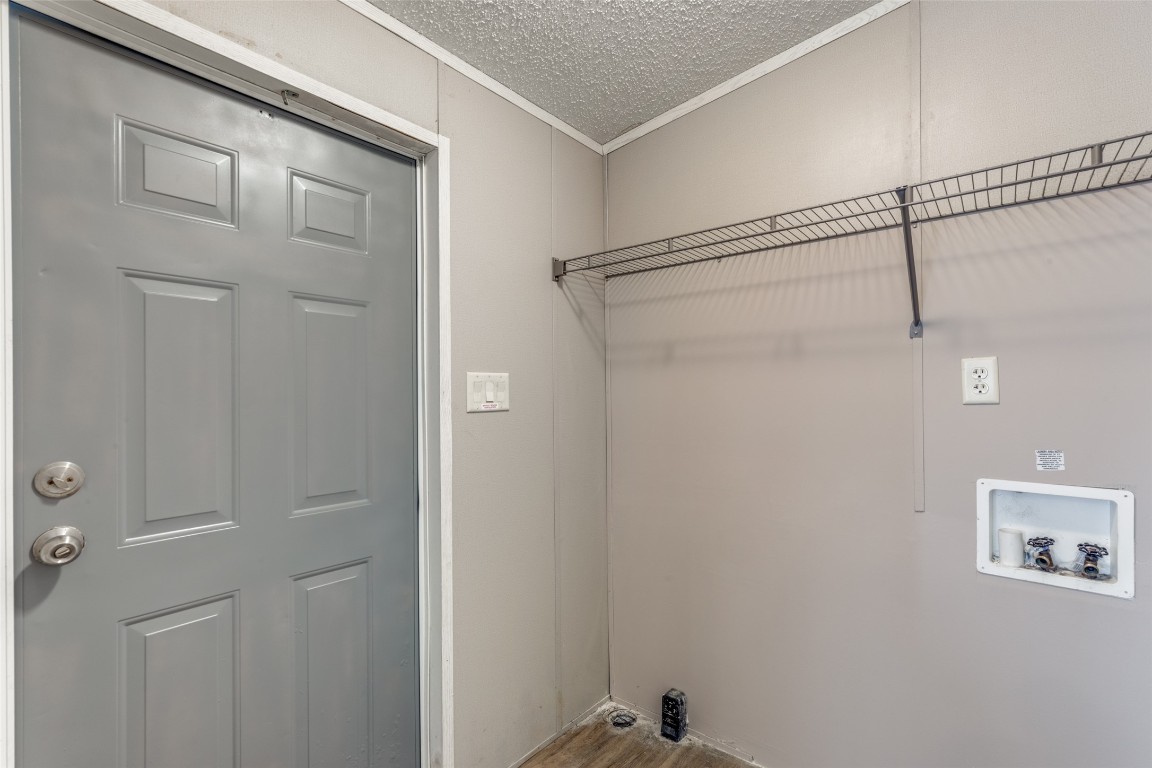 346 Rancho Linda Drive Lockhart, TX 78644 - Photo 14 of 25 a view of a room with rack on the wall