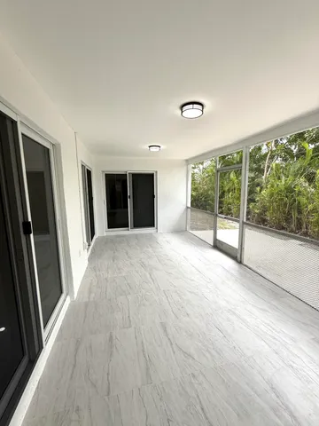 a picture of a bathroom with a mirror