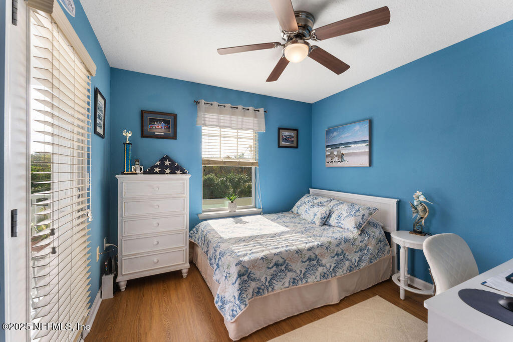 205 Islander Drive St. Augustine, FL 32080 - Photo 25 of 43 a bedroom with a bed and a window