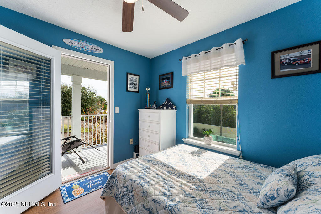 205 Islander Drive St. Augustine, FL 32080 - Photo 26 of 43 a bedroom with a bed and a window