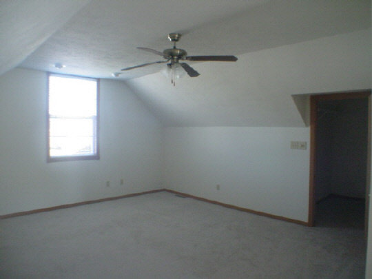 3963 Linden Road Rockford, IL 61109 - Photo 2 of 6 an empty room with a window