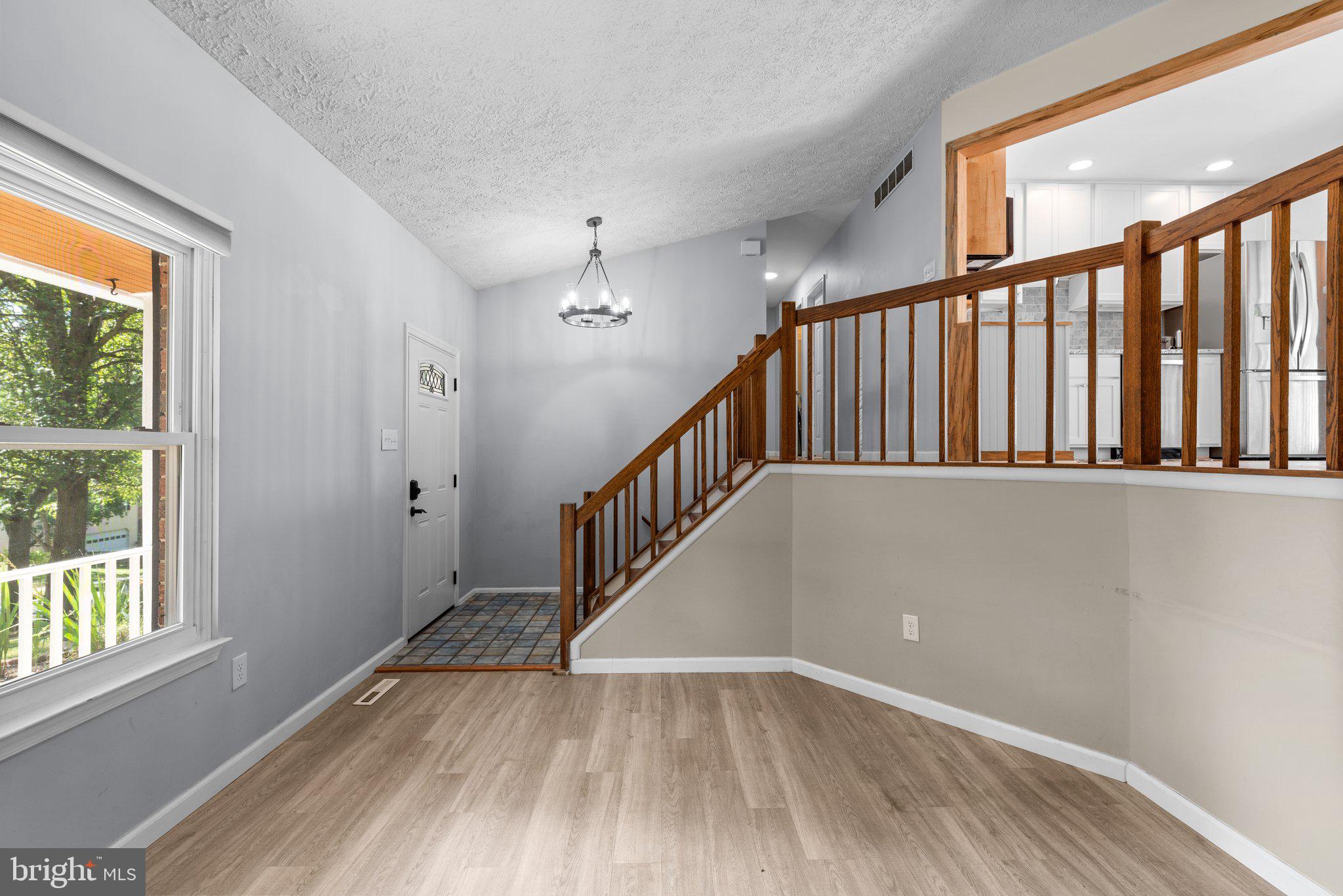 8630 Bali Road Ellicott City, MD 21043 - Photo 3 of 32 Welcome to this split Foyer. View of Living room