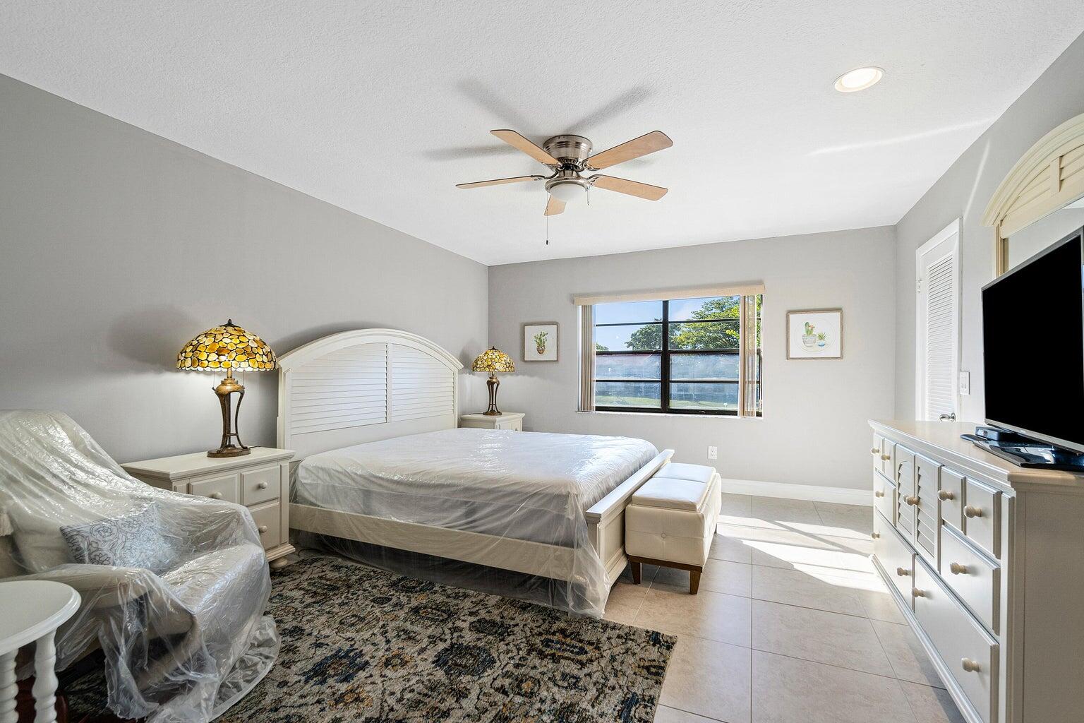 21863 Arriba Real, Unit 8K Boca Raton, FL 33433 - Photo 13 of 26 PRIMARY BEDROOM