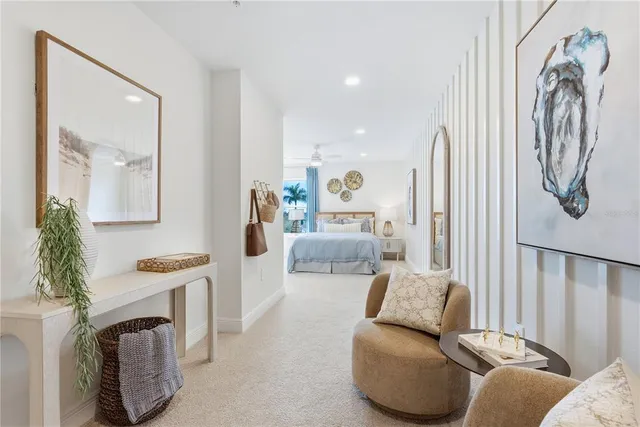 a bedroom with a bed and a couch