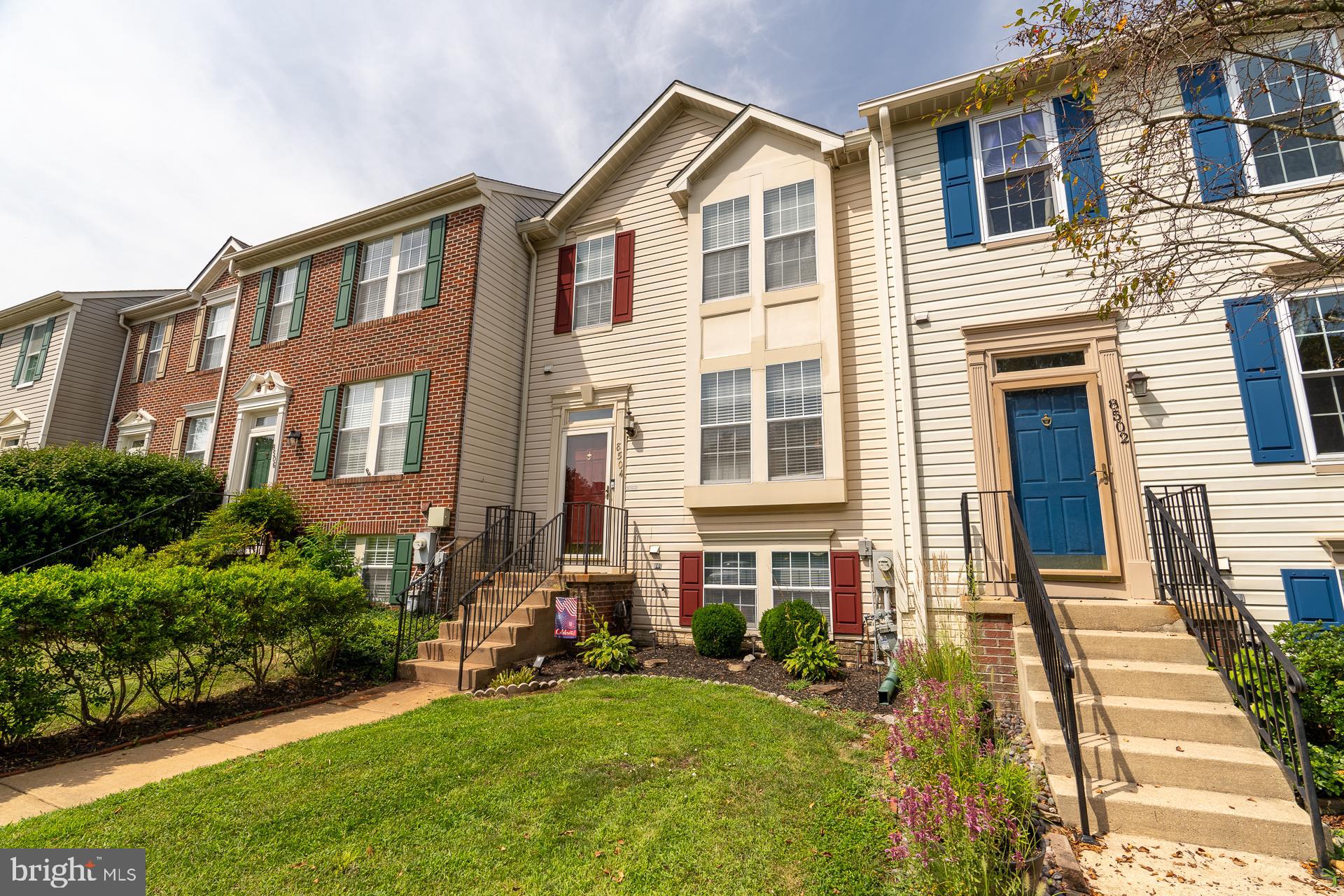 8504 Pine Meadows Drive Odenton, MD 21113 - Photo 1 of 32 a front view of a house with a yard