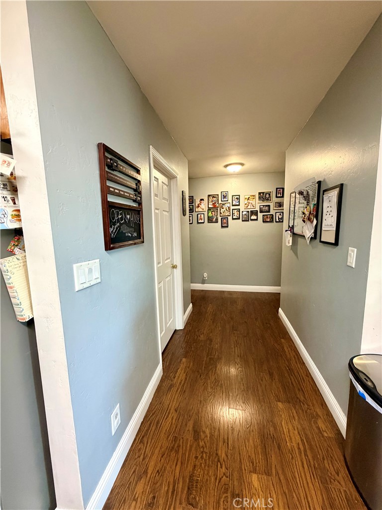 1896 Maryvale Lane Hemet, CA 92544 - Photo 12 of 33 a view of hallway with wooden floor