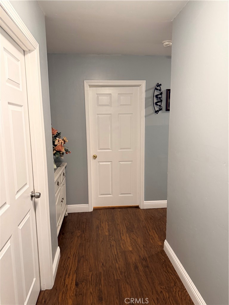 1896 Maryvale Lane Hemet, CA 92544 - Photo 14 of 33 an entryway with wooden floor and cabinet