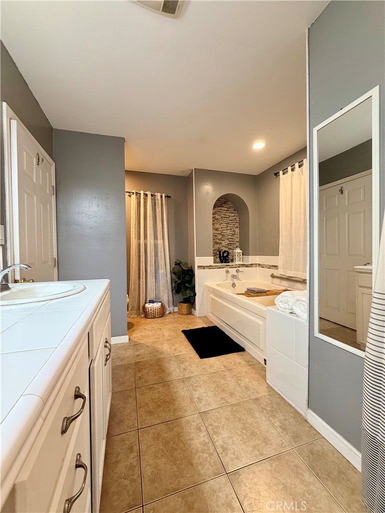 1896 Maryvale Lane Hemet, CA 92544 - Photo 20 of 33 a large kitchen with a stove and a refrigerator