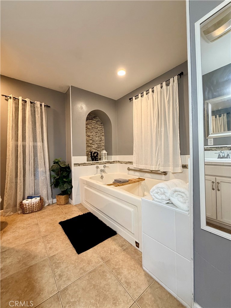 1896 Maryvale Lane Hemet, CA 92544 - Photo 21 of 33 a large white kitchen with a large window