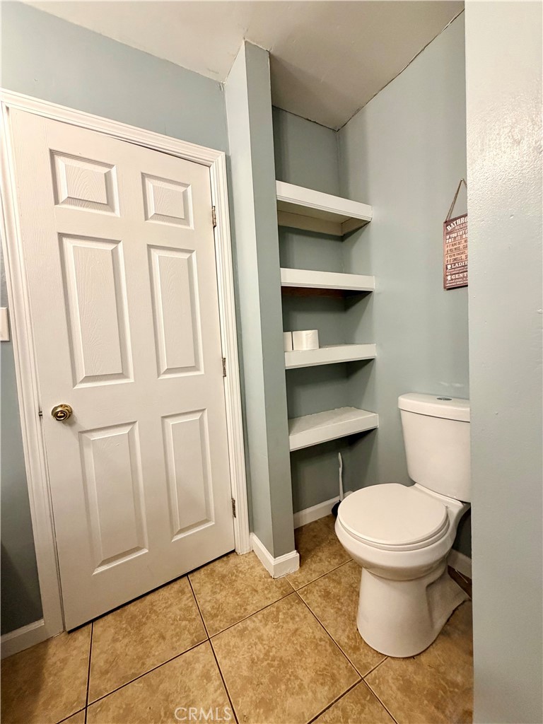1896 Maryvale Lane Hemet, CA 92544 - Photo 27 of 33 a bathroom with a toilet and a sink