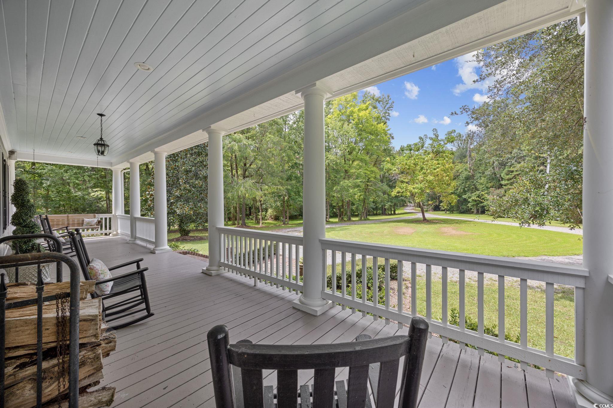 3750 Highway 813 Conway Sc 29526 Conway, SC 29526 - Photo 2 of 40 Porch with view of scattered trees and a yard