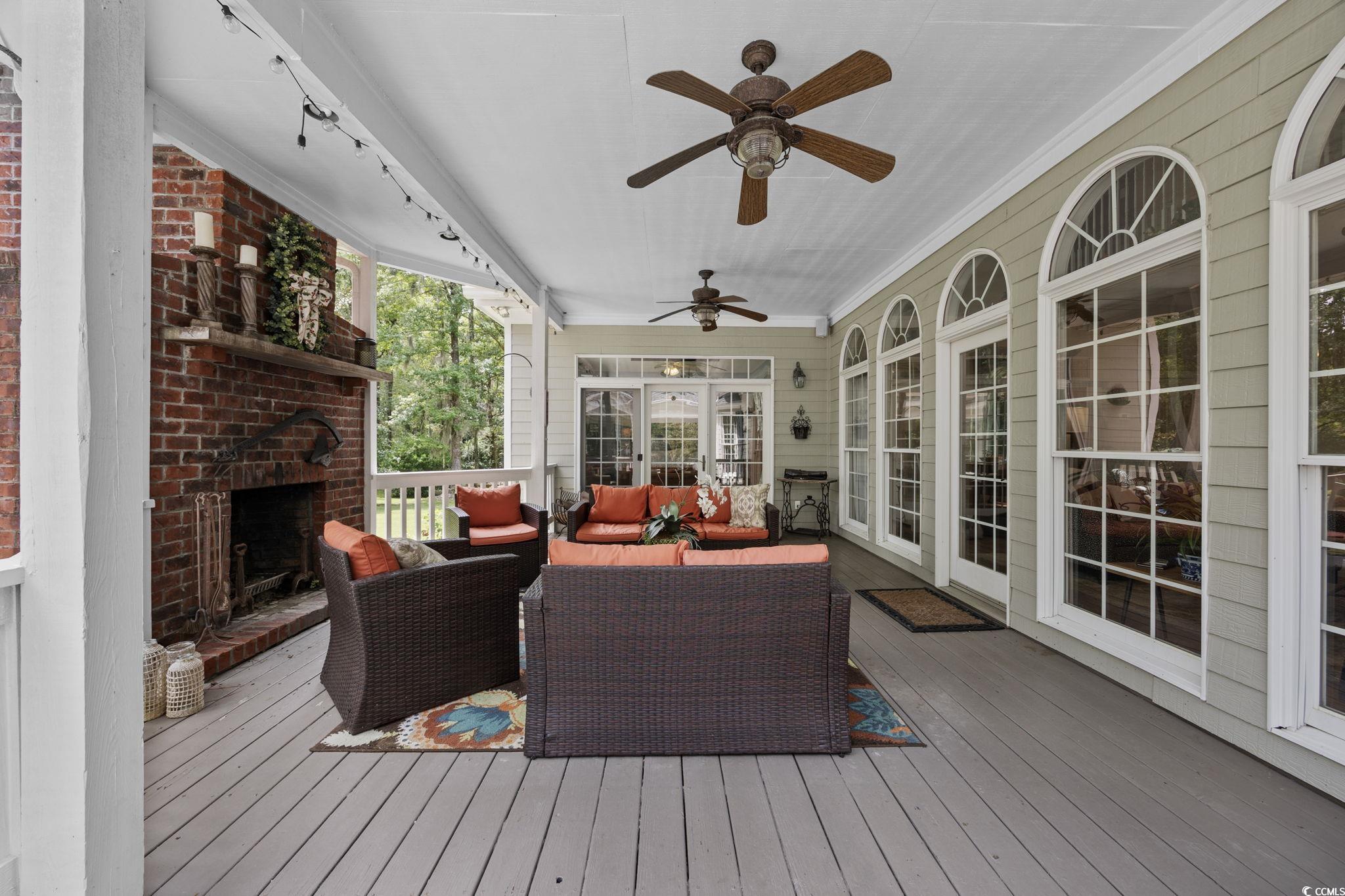 3750 Highway 813 Conway Sc 29526 Conway, SC 29526 - Photo 22 of 40 Deck with an outdoor living space with a fireplace